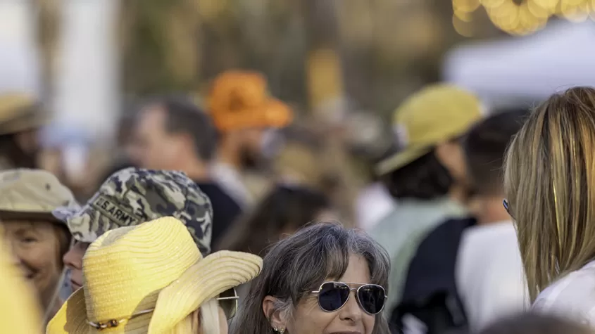 woman smiling in crowd