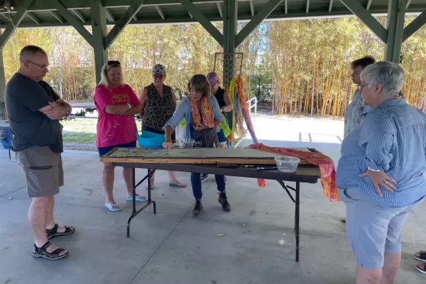 Visitors can paint their way to relaxation in a scarf painting class. 
