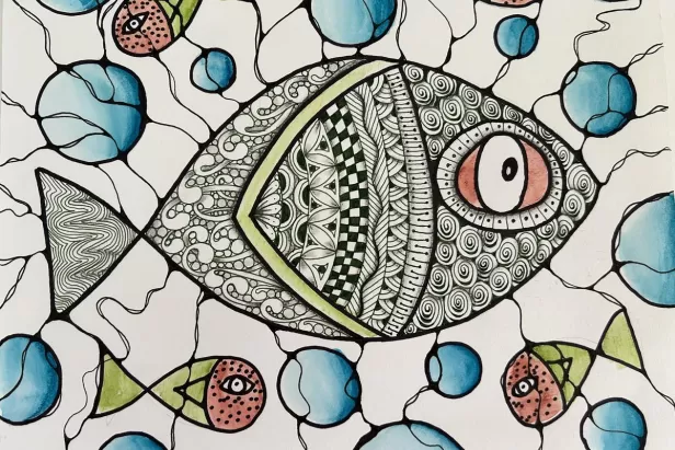 drawing of a fish with multiple patterns through out, blue bubbles and little red fish drawn as well
