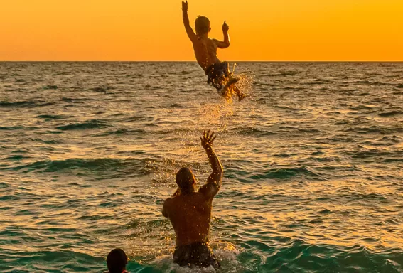 Family having fun in sea