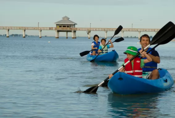 family kayaking paddling