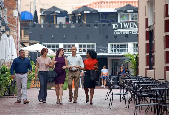 Group walking in the Fort Myers River District