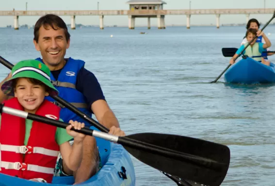 a father and son kayaking