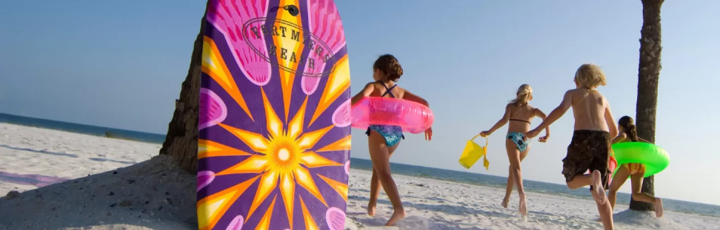 Kids running on Fort Myers Beach
